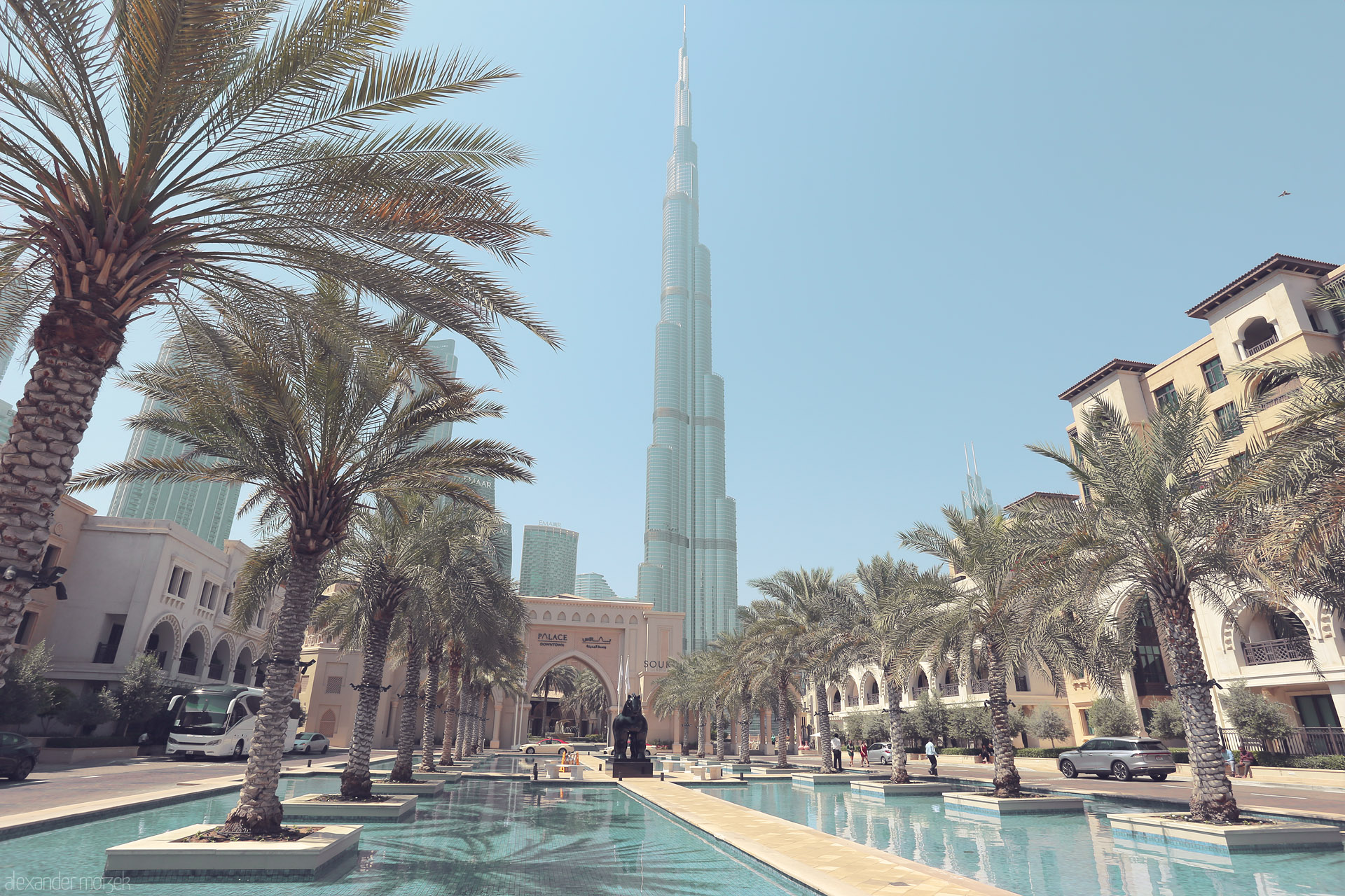 Foto von Palm-lined pools and luxury meet under the Burj Khalifa’s gaze in downtown Dubai’s regal Souk Al Bahar.